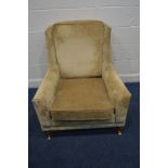 A DURESTA GOLD UPHOLSTERED ARMCHAIR on square tapering legs and brass caps and casters, width 81cm x