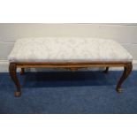 A LONG REPRODUCTION BEECH FOOTSTOOL on claw feet, length 115cm (this stool does not comply with
