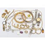 AN ASSORTMENT OF COSTUME JEWELLERY, to include a brass tone sweetheart brooch, a miniature mother of