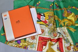 A BOXED HERMES SILK SCARF, designed by Cathy Latham circa 1988, the architectural/theatre motifs