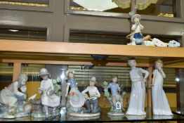 FOUR NAO FIGURES/GROUPS AND A NAO TABLE LAMP, comprising girl in nightdress, height 29cm, boy in