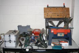 A COLLECION OF POWER AND HANDTOOLS including a Bosch half sheet sander , a Bosch circular saw and