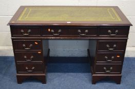 A MODERN MAHOGANY PEDESTAL DESK, with a green leather and gilt tool inlay top, above eight