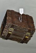 A LATE 19TH CENTURY BLACK FOREST WOODEN CASKET IN THE FORM OF A TRUNK, with bark effect exterior