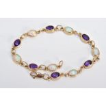 A 9CT GOLD LINE BRACELET, designed with twelve oval links set with six oval cut amethyst and six