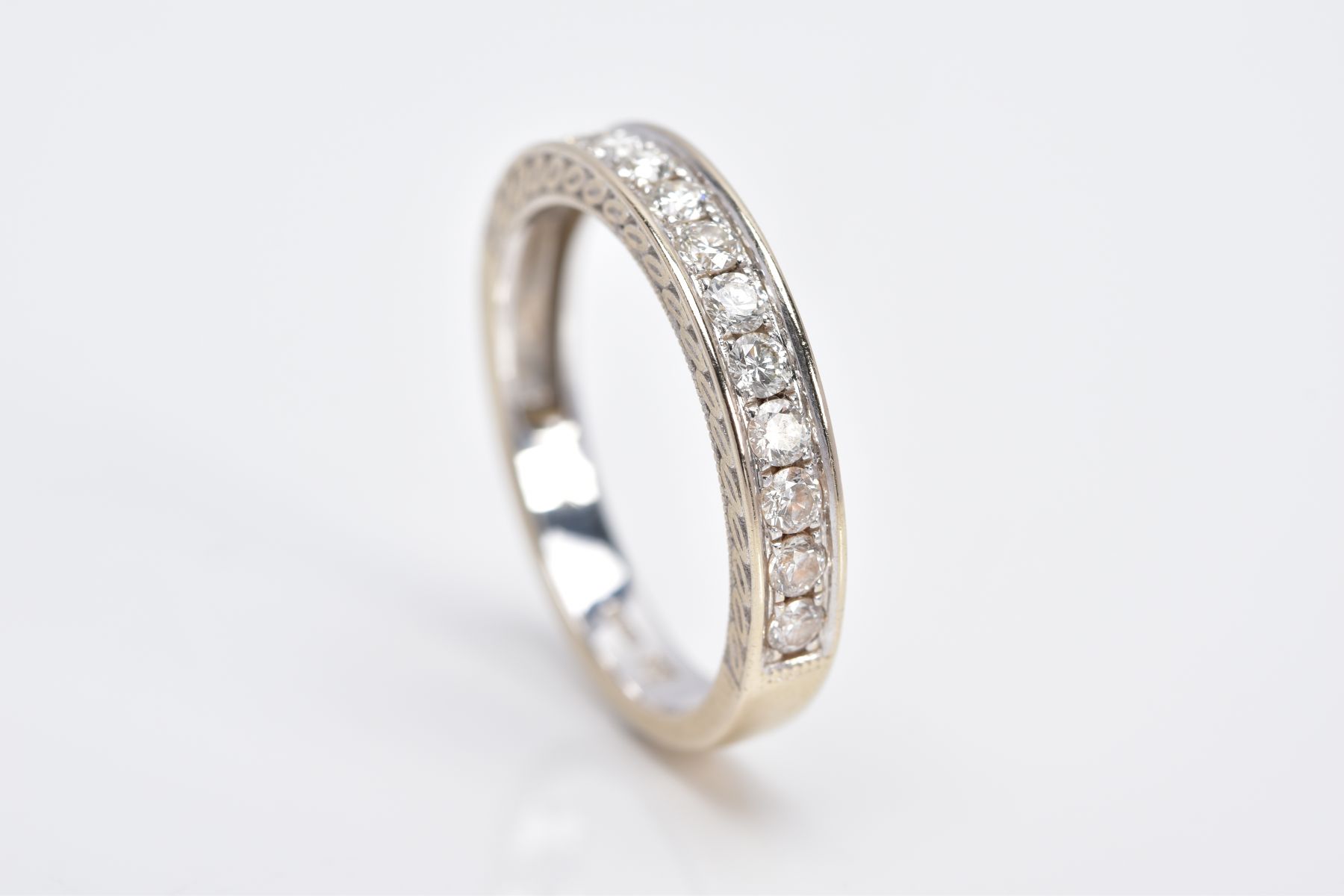 AN 18CT WHITE GOLD DIAMOND HALF ETERNITY RING, designed with a row of round brilliant cut - Image 5 of 5