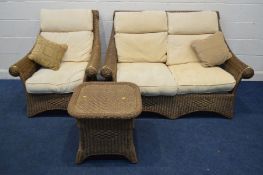 A WICKER THREE PIECE LOUNGE SUITE, with cream cushions, comprising a two seater settee, armchair and