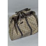 A GUCCI JOY BOSTON HANDBAG, vinyl coated canvas with leather trim, size approximately height 21cm,