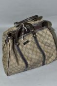 A GUCCI JOY BOSTON HANDBAG, vinyl coated canvas with leather trim, size approximately height 21cm,