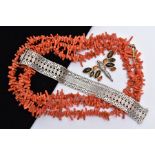 A CORAL BRANCH NECKLET, AN AMBER BROOCH AND A SILVER BRACELET, the long coral branch necklet