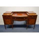 AN EDWARDIAN MAHOGANY, MARQUETRY INLAID AND STRUNG PEDESTAL SIDEBOARD, the two pedestals each with