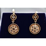 A PAIR OF YELLOW METAL DIAMOND DROP EARRINGS, each designed with a circular drop set with seven rose