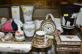 A WEDGWOOD BLACK JASPERWARE VASE, TWO WEDGWOOD CLIO ORNAMENTAL ITEMS AND MATCHING CUP AND SAUCER,