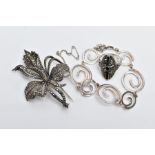 A SILVER MARCASITE BROOCH, A SILVER BRACELET AND A WHITE METAL MARCASITE RING, the silver