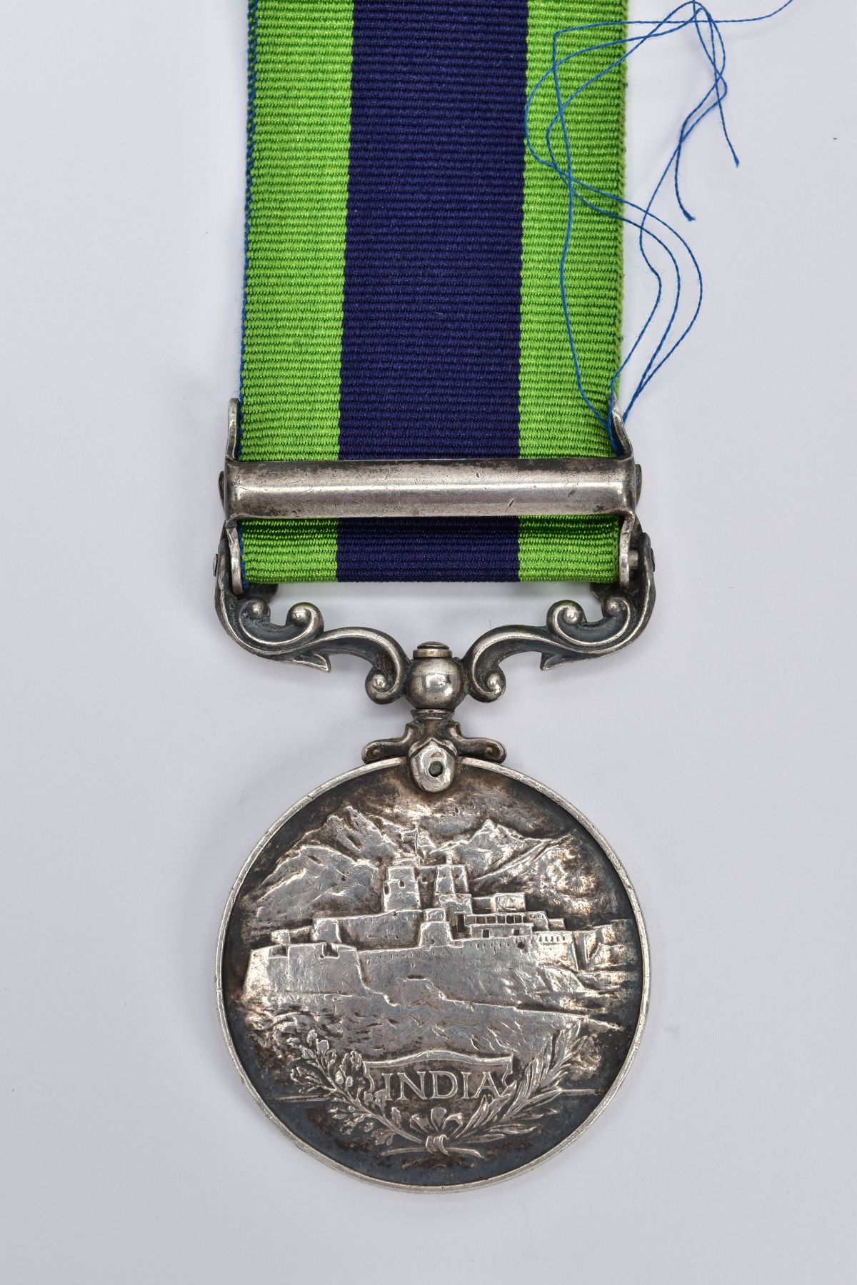 A GEORGE V MEDAL WITH RIBBON, round medal of 'North West Frontier 1930-31 India' awarded to '4384811 - Image 2 of 4