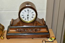 A LATE VICTORIAN ROSEWOOD AND EBONISED THIRTY HOUR MANTEL CLOCK, the drum shaped case above a