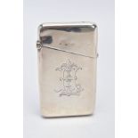 A VICTORIAN SILVER CARD CASE, rectangular plain polished form engraved monogram to one side opens to