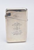 A VICTORIAN SILVER CARD CASE, rectangular plain polished form engraved monogram to one side opens to