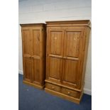 A MODERN PINE TWO DOOR WARDROBE, above two drawers, width 110cm x depth 57cm x height 200cm together