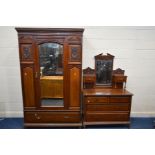 AN EDWARDIAN WALNUT TWO PIECE BEDROOM SUITE, with foliate carved panels, comprising a single