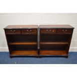 A PAIR OF MODERN MAHOGANY OPEN BOOKCASES with two drawers, width 76cm x depth 30cm x height 83cm