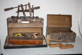 TWO VINTAGE WOODEN CARPENTERS TOOLBOXES including wooden planes, mallets, clamps, etc