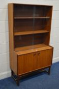 A TURNIDGE OF LONDON TEAK GLAZED DOUBLE SLIDING DOOR BOOKCASE, width 91cm x depth 41cm x height