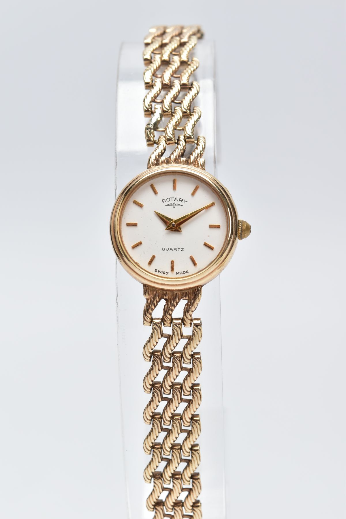 A LADIES 9CT GOLD ROTARY WRISTWATCH, round white dial signed 'Rotary Quartz', baton markers, gold