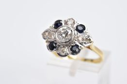 A YELLOW METAL DIAMOND AND SAPPHIRE RING, designed with a central early brilliant cut diamond in a
