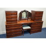 A MODERN MAHOGANY FIVE PIECE BEDROOM SUITE, comprising a long dressing table with eight drawers, a