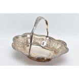 A GEORGE IV SILVER BASKET TRAY, of an oval form, embossed floral detailing to the bowl, with a