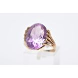 A 9CT GOLD AMETHYST SINGLE STONE RING, amethyst measuring approximately 16.0mm x 12.0mm, ring size