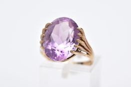 A 9CT GOLD AMETHYST SINGLE STONE RING, amethyst measuring approximately 16.0mm x 12.0mm, ring size