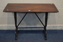 A RECTANGULAR CAST IRON PUB TABLE with a mahogany top, width 106cm x depth 45cm x height 74cm