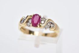 A 9CT GOLD RUBY AND DIAMOND RING, designed with a central oval cut ruby flanked with round brilliant