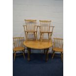 A PINE DROP LEAF KITCHEN TABLE, and four beech armchairs (5)
