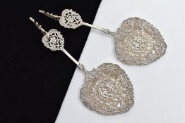 TWO VICTORIAN PIERCED CAST SPOONS, decorated with cherubs, pheasants and foliate bowls, cherub and