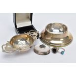 A SILVER TEA STRAINER, TWO SILVER RINGS AND A MOTHER OF PEARL TRINKET, the tea strainer with