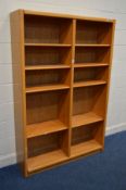 A MID TO LATE 20TH CENTURY LIGHT OAK OPEN BOOKCASE, with adjustable shelves, width 122cm x depth