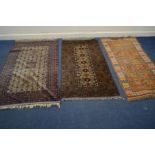 TWO KAZAK RUGS, one in blue the russet, 200cm x 118cm, 189cm x 100cm together with an orange