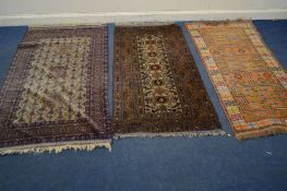 TWO KAZAK RUGS, one in blue the russet, 200cm x 118cm, 189cm x 100cm together with an orange