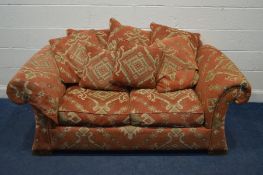 A KAZAK STYLE ORANGE UPHOLSTERED TWO SEATER SOFA, width 182cm