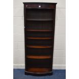 A MODERN MAHOGANY BOWFRONT OPEN BOOKCASE, with five adjustable shelves, width 78cm x depth 37cm x