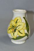 MOORCROFT 'BERMUDA LILY' PATTERN VASE, impressed backstamp, height approximately 9.5cm (