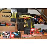 A LARGE QUANTITY OF UNBOXED AND ASSORTED SCALEXTRIC TRACK AND ACCESSORIES, to include lap