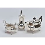 A GEORGE V THREE PIECE SILVER TEA SERVICE SET, to include a teapot and coffee pot each with a