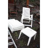 FOUR WHITE PLASTIC FOLDING GARDEN CHAIRS AND A SMALL TABLE and a small quantity of garden tools