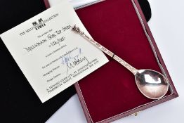 A MILLENNIUM SEAL SILVER SPOON, decorative chevron handle with a seal for 'AD 2000' to the end of