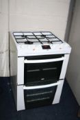 A ZANUSSI GAS COOKER with a four ring hob over a grill and an oven 60cm wide (PAT pass and