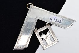 A SILVER MASONIC MEDAL, Masonic symbol medal with a foliate decorated trim, fitted with a single